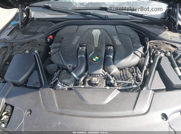 WBA7F2C53GG416445 2016 BMW 7 SERIES Black Rear view