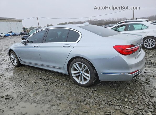 WBA7F2C56GG416813 2016 BMW 7 SERIES Silver Trasero izquierdo