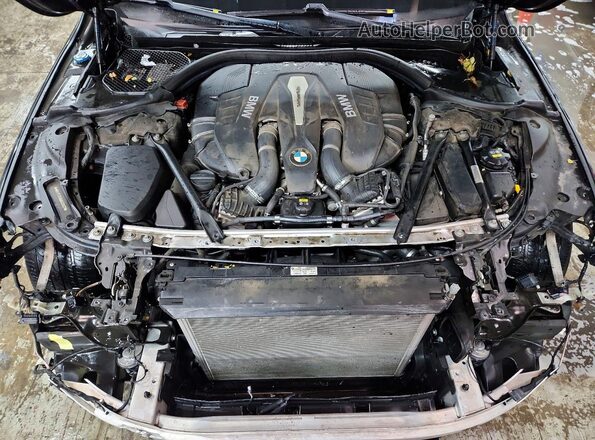 WBA7F2C56HG422631 2017 BMW 7 SERIES Charcoal Вид задньої частини салону