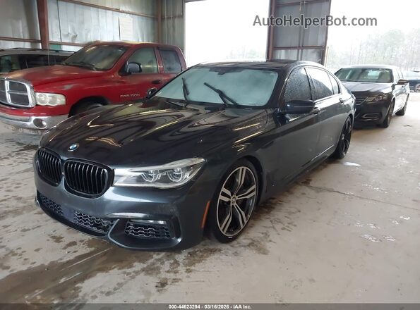 WBA7F2C57GG415668 2016 BMW 7 SERIES Gray Vista tres cuartos delantera izquierda