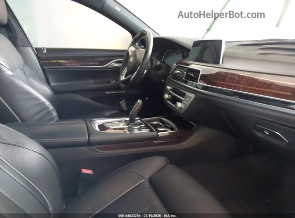 WBA7F2C57GG415668 2016 BMW 7 SERIES Gray Vista interior delantera