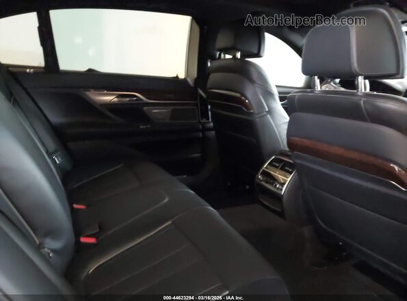 WBA7F2C57GG415668 2016 BMW 7 SERIES Gray Vista de la etiqueta del VIN