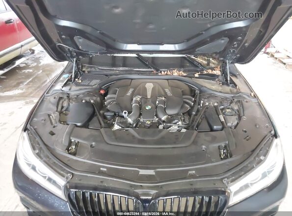 WBA7F2C57GG415668 2016 BMW 7 SERIES Gray Vista trasera