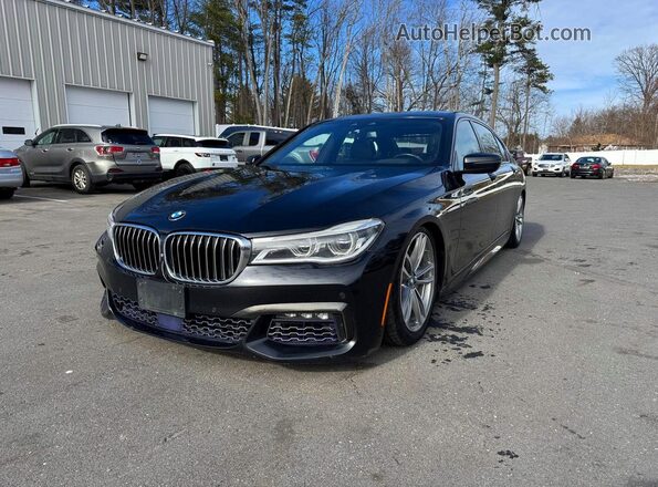 WBA7F2C58HG422355 2017 BMW 7 SERIES Black Trasero izquierdo