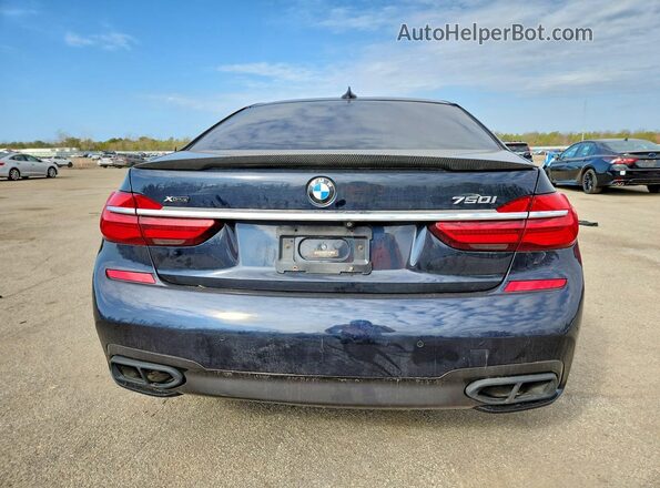 WBA7F2C59GG417938 2016 BMW 7 SERIES Blue Rear view