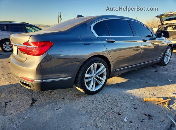 WBA7F2C5XGG417897 2016 BMW 7 SERIES Gray Trasero derecho