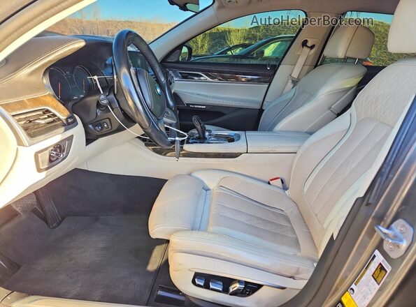 WBA7F2C5XGG417897 2016 BMW 7 SERIES Gray Vista interior delantera