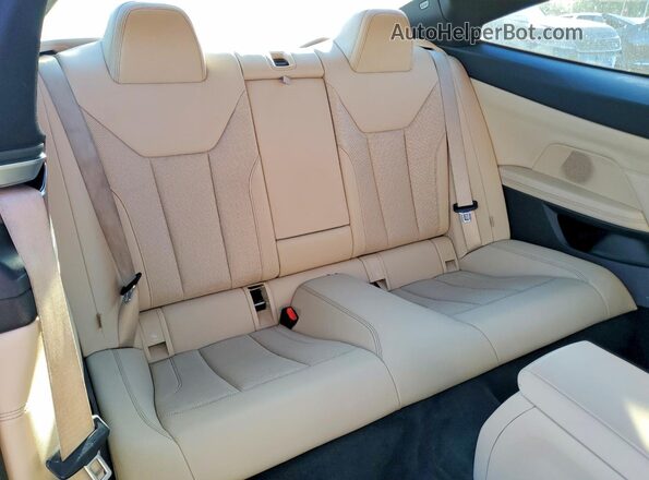 WBA83AP02NCJ36705 2022 BMW M4 Orange Rear seats view
