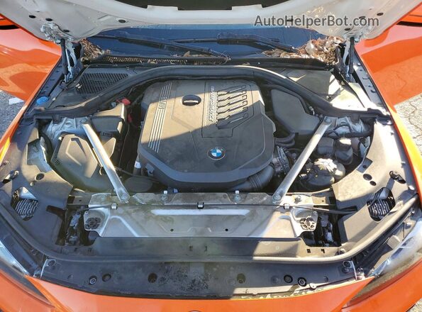 WBA83AP02NCJ36705 2022 BMW M4 Orange Rear interior view
