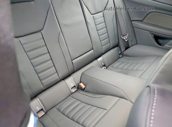 WBA83DA01TCV61680 2026 BMW M4 Black Vista de los asientos traseros