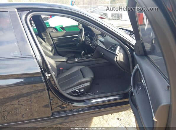 WBA8B9G58HNU50669 2017 BMW 3 SERIES Black Front interior view
