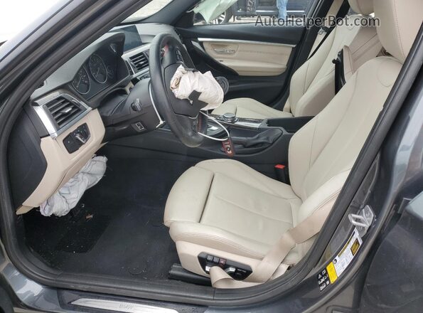 WBA8E3G59GNT26901 2016 BMW 3 SERIES Gray Вид салону спереду