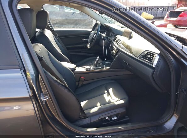 WBA8E5G32HNU42579 2017 BMW 3 SERIES Gray Front interior view