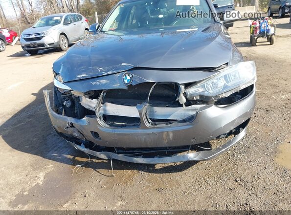 WBA8E5G32HNU42579 2017 BMW 3 SERIES Gray Front view