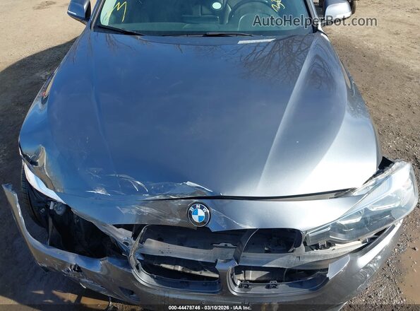 WBA8E5G32HNU42579 2017 BMW 3 SERIES Gray Rear view