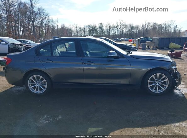 WBA8E5G32HNU42579 2017 BMW 3 SERIES Gray Rear interior view