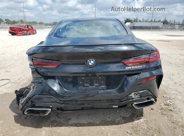 WBABC4C08MCG41534 2021 BMW M8 Black Rear view