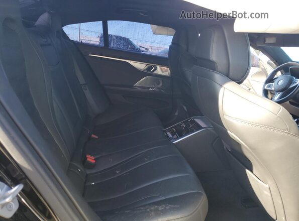WBAGV2C07RCN06456 2024 BMW 8 SERIES Black Rear seats view