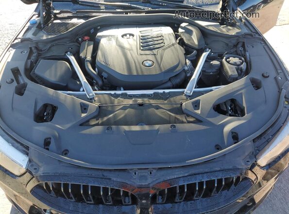 WBAGV2C07RCN06456 2024 BMW 8 SERIES Black Rear interior view