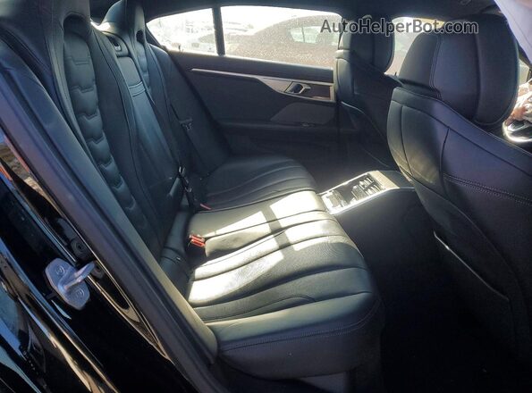WBAGV4C06RCN16245 2024 BMW 8 SERIES Black Rear seats view