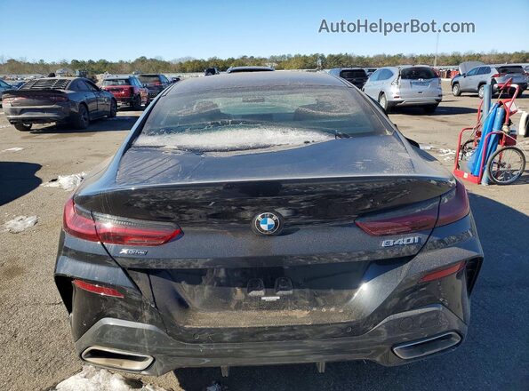 WBAGV4C06RCN16245 2024 BMW 8 SERIES Black Rear view