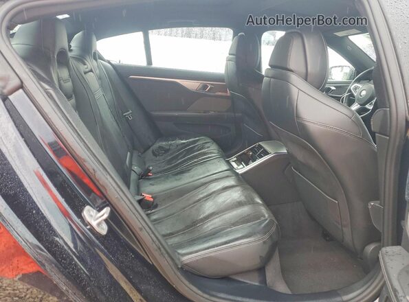 WBAGV4C08RCR88933 2024 BMW 8 SERIES Black უკანა სავარძლების ხედი