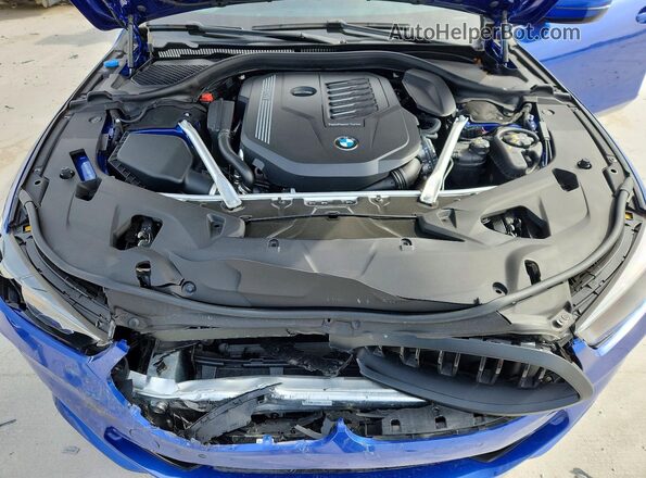 WBAGV4C09SCU66057 2025 BMW 8 SERIES Blue Vista interior trasera