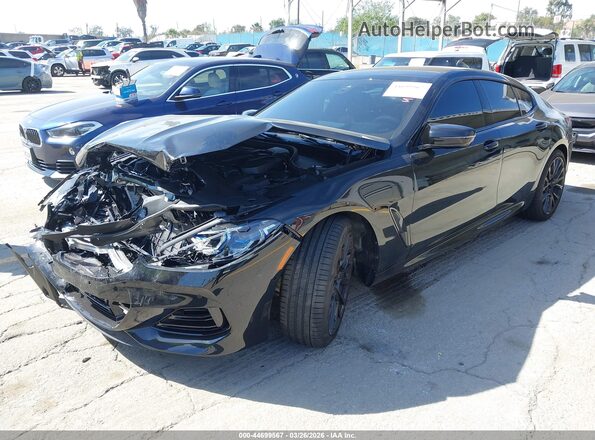 WBAGV8C02TCW85192 2026 BMW M8 Black Vista tres cuartos delantera izquierda