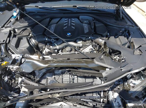 WBAGV8C02TCW85192 2026 BMW M8 Black Vista trasera