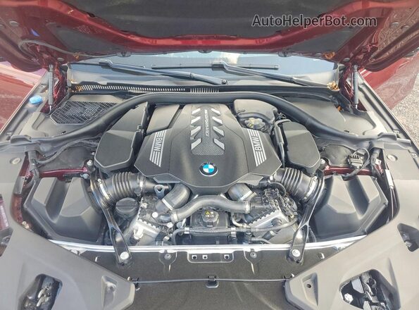WBAGV8C0XSCT85219 2025 BMW M8 Burgundy Widok wnętrza z tyłu