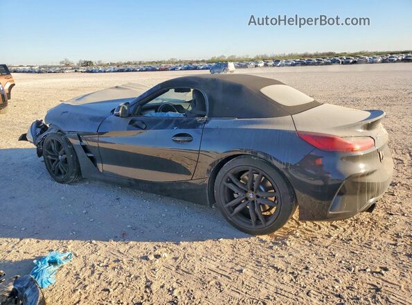 WBAHF3C08PWY20846 2023 BMW Z4 Black Trasero izquierdo