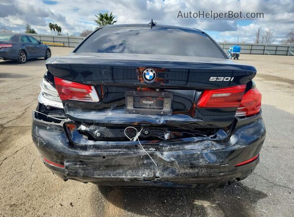 WBAJA5C51JG899608 2018 BMW 5 SERIES Black Rear view