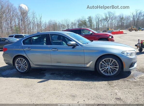 WBAJA5C58JWA38273 2018 BMW 5 SERIES Gray Vista interior trasera