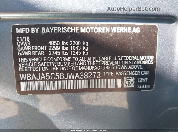WBAJA5C58JWA38273 2018 BMW 5 SERIES Gray Vista del compartimento del motor