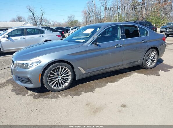 WBAJA5C58JWA38273 2018 BMW 5 SERIES Gray Vista tres cuartos delantera izquierda