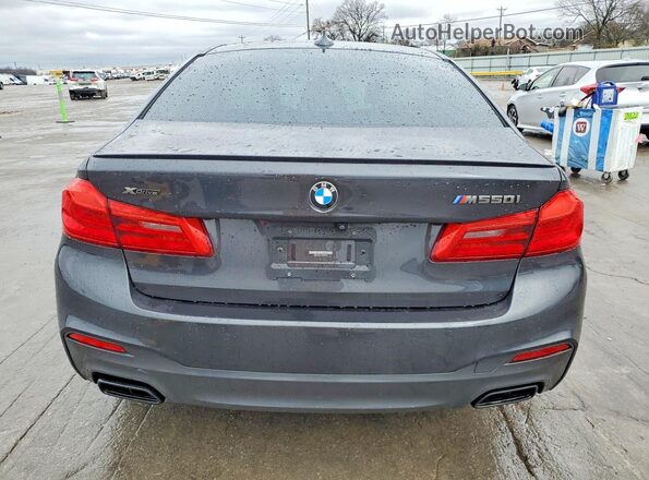 WBAJB9C51JB035479 2018 BMW M5 Gray Rear view