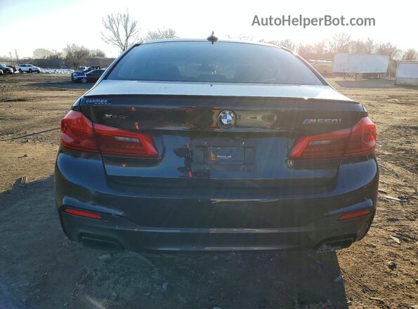 WBAJB9C53KB464978 2019 BMW M5 Black Widok z tyłu