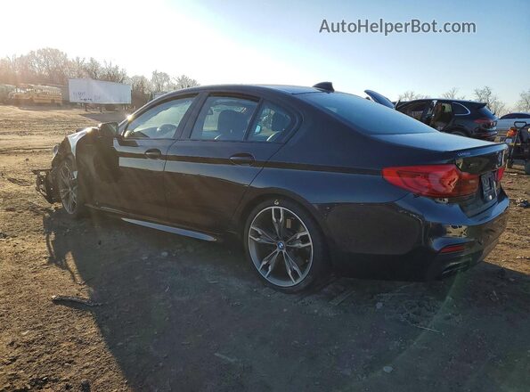 WBAJB9C53KB464978 2019 BMW M5 Black Tył lewy