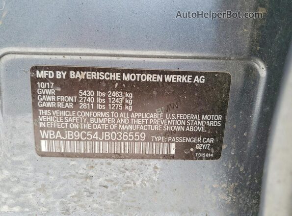 WBAJB9C54JB036559 2018 BMW M5 Gray Vista de la etiqueta del VIN