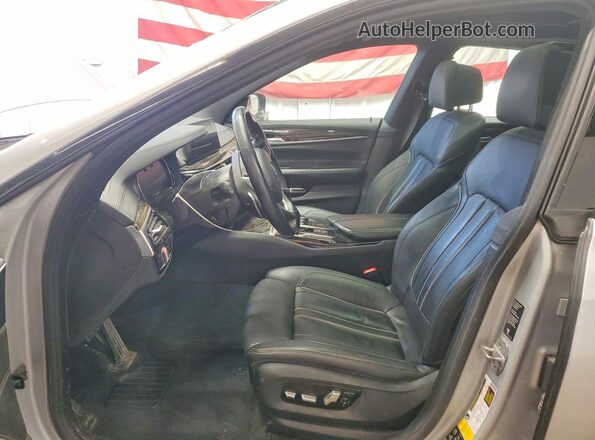 WBAJV6C54JBK07638 2018 BMW 6 SERIES Silver Front interior view