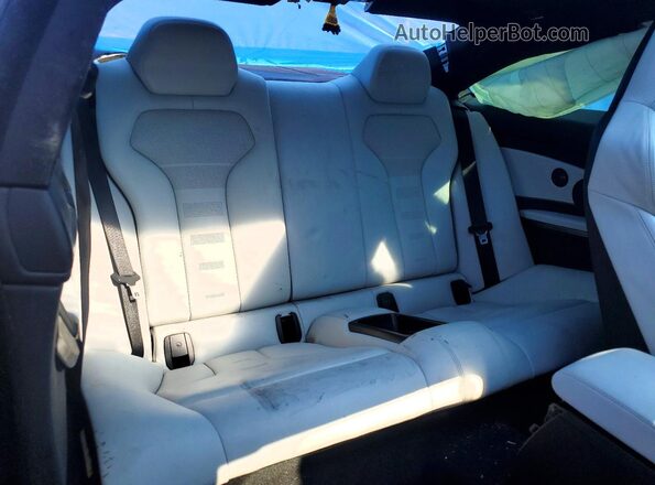 WBS4Y9C57JAC87205 2018 BMW M4 Black Rear seats view