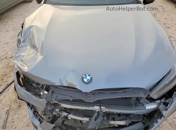 WBSGV0C06SCT93976 2025 BMW M8 Gray Սալոնի հետևի տեսք