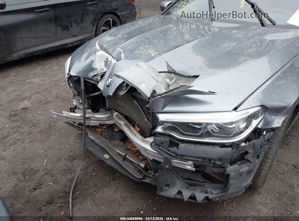 WBSJF0C51JB282593 2018 BMW M5 Gray Widok z przodu