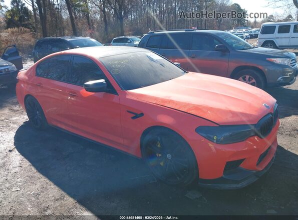 WBSJF0C57JB283411 2018 BMW M5 Оранжевый Вид задней части салона