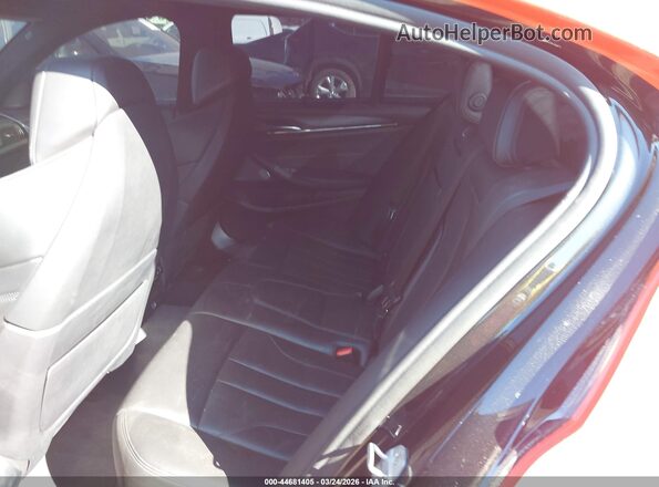 WBSJF0C57JB283411 2018 BMW M5 Оранжевый Вид наклейки с VIN-кодом