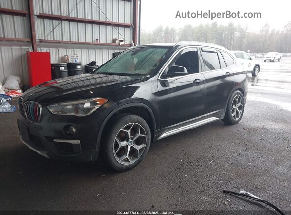 WBXHT3C34H5F77409 2017 BMW X1 Black 
