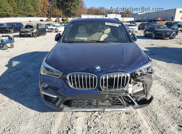 WBXHT3C36H5F75127 2017 BMW X1 Blue Vista frontal