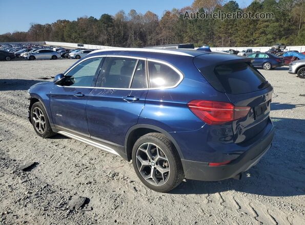 WBXHT3C36H5F75127 2017 BMW X1 Blue Trasero izquierdo