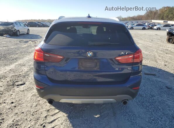 WBXHT3C36H5F75127 2017 BMW X1 Blue Vista trasera