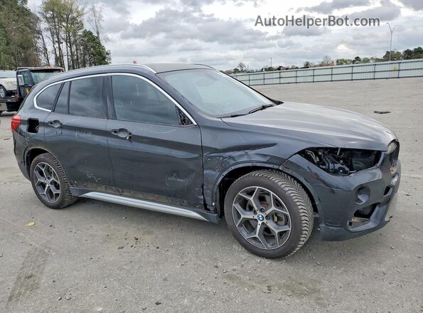 WBXHT3Z34G4A48778 2016 BMW X1 Черный Передняя правая четверть